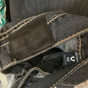Mens True Religion jeans. Black with tan stitching. Used. Size 40.